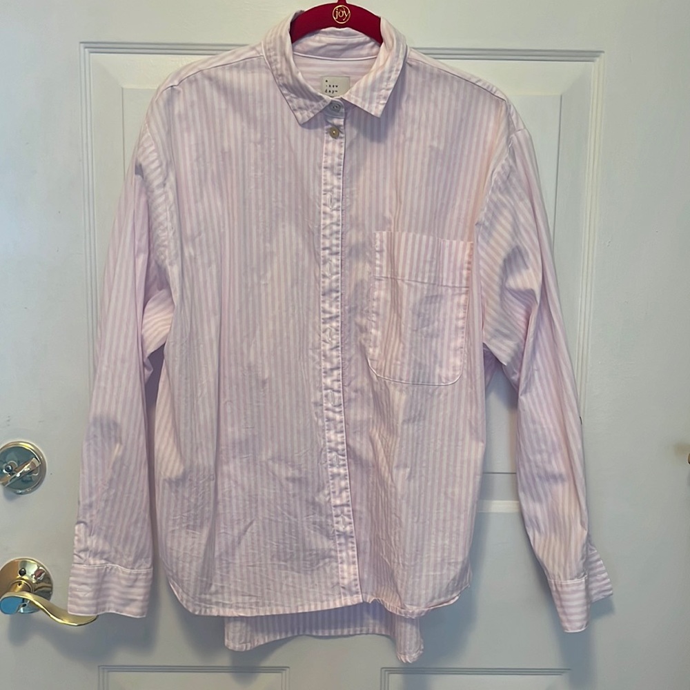 A New Day Button down pink and white striped blouse.